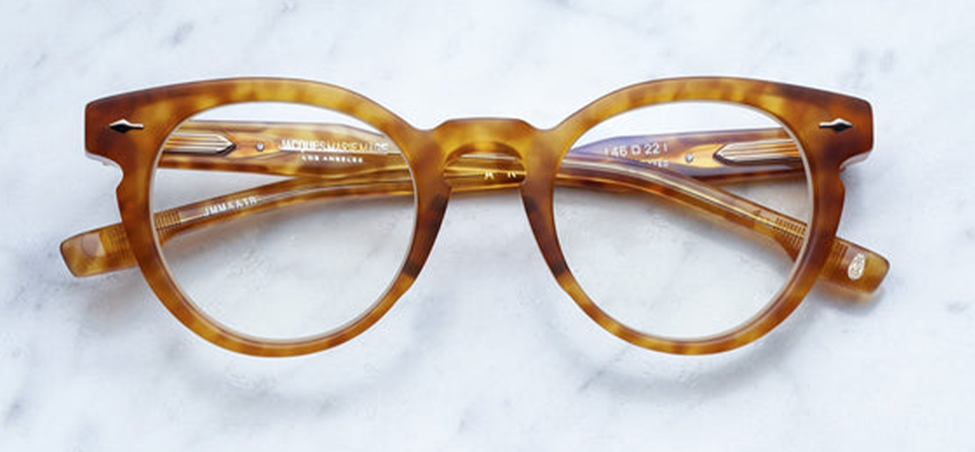 Front view of Jacques Marie Mage Arp Camel glasses showcasing warm camel acetate with bold rectangular shape
