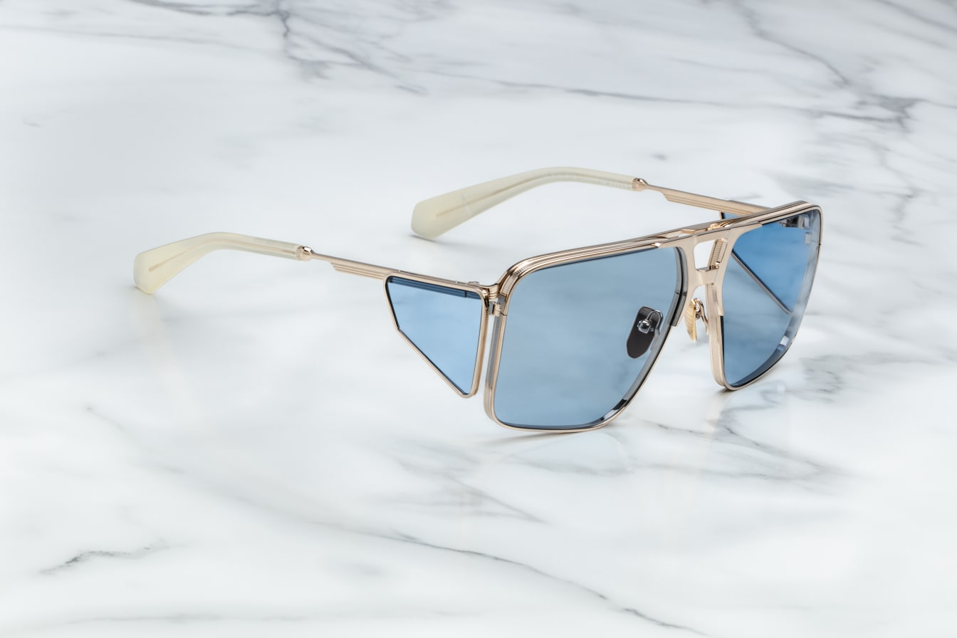 Side profile of Jacques Marie Mage Assen in Altan showing sculpted temples and signature silver arrowhead hinge detailing, available at WINK Optometrists.