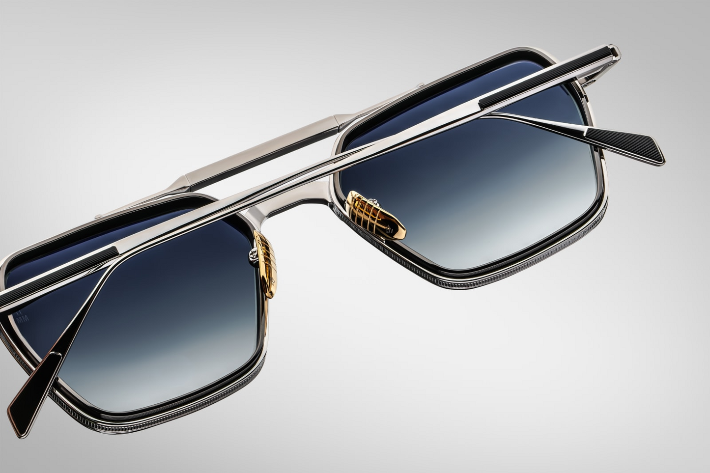 Back view of Jacques Marie Mage Commodore sunglasses in Pacific displaying the interior temple structure and smooth frame curvature, available at WINK Optometrists.