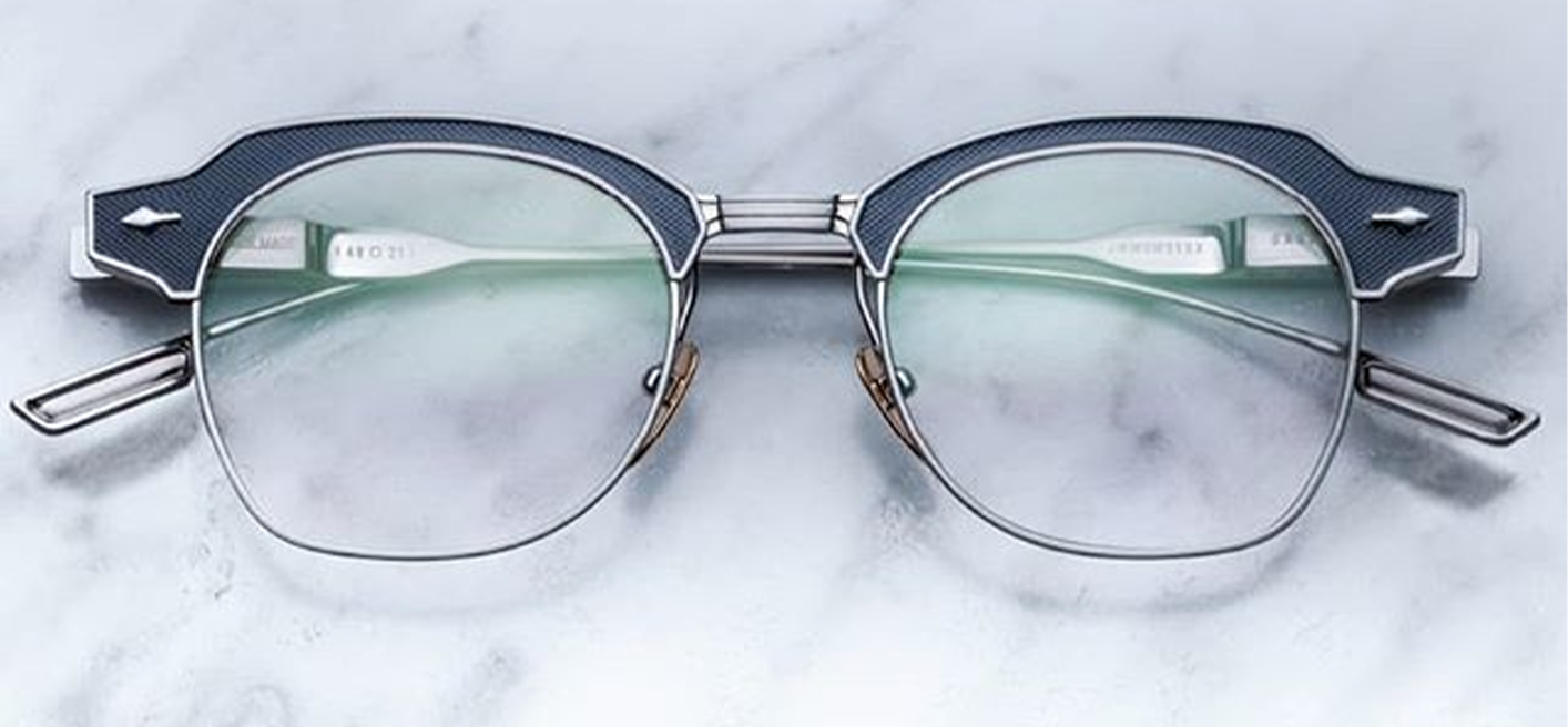 Front view of Jacques Marie Mage Daumensil sunglasses in Silver, featuring a bold rectangular silver acetate frame with polished finish, available at WINK Optometrists.