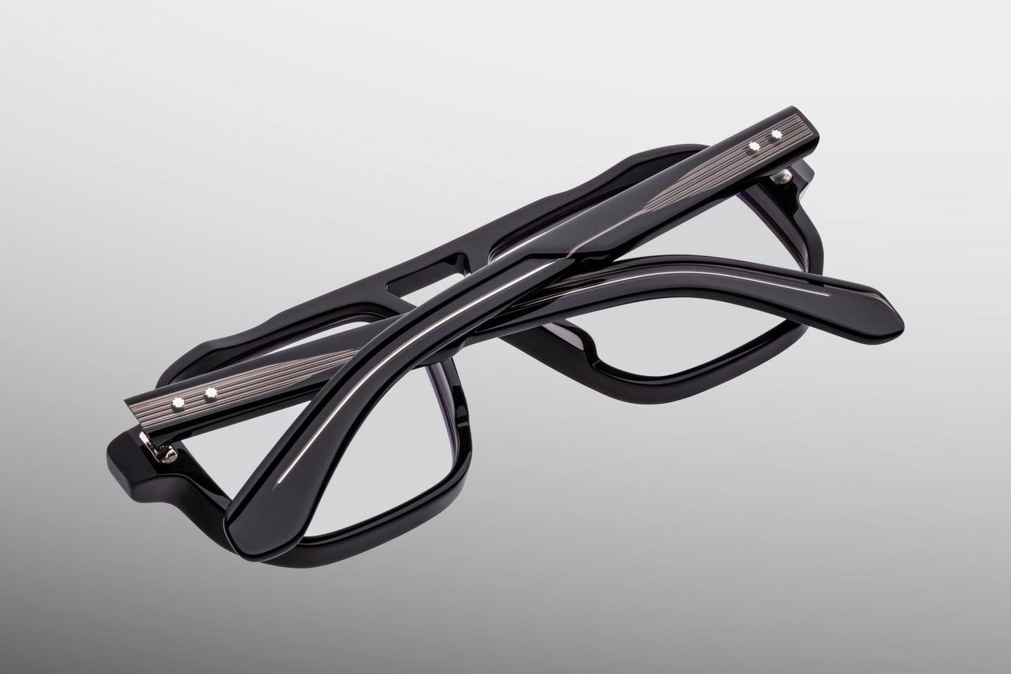 Rear view of Jacques Marie Mage Evans Raven eyeglasses showing clean acetate rims, inner double‑nose‑bridge structure, visible exposed wirecore, and limited‑edition batch numbering of 500 pieces