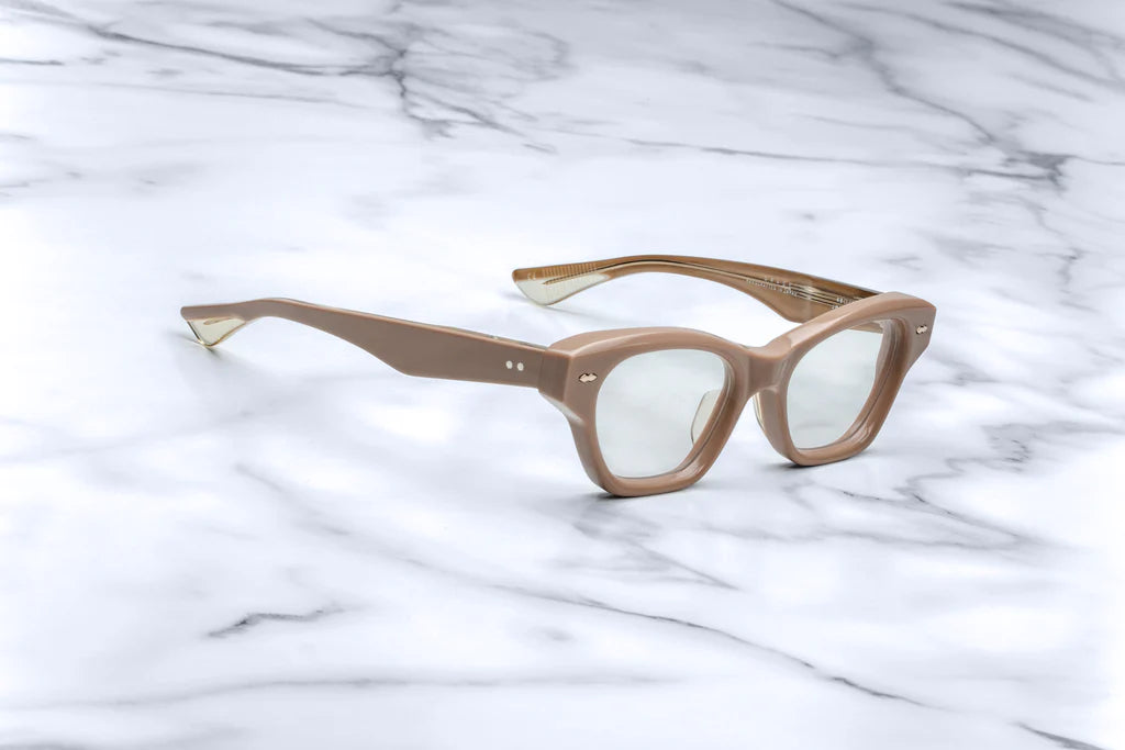 Side profile of Jacques Marie Mage Grace 2 Porter sunglasses, highlighting the slim acetate temples and tension-secured custom hinge. The frame's gentle silhouette and subtle lift in the eye area are emphasized, offering a balanced and elegant appearance