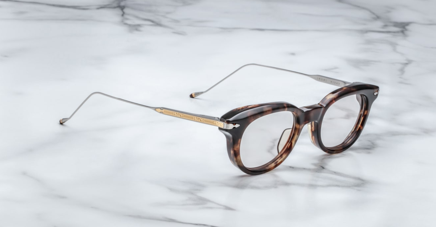 Side view of Jacques Marie Mage Hisao optical glasses in Havana, showing the thick acetate temples, signature silver arrow hardware, and rich tortoiseshell tones