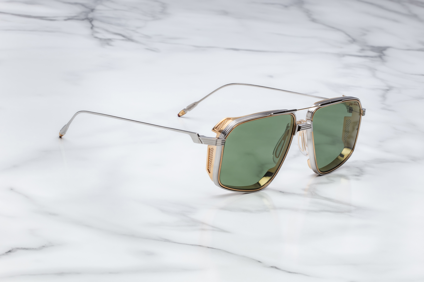 Side view of Jacques Marie Mage Jagger glasses in Electrum, showing the sculpted gold metal temples with finely engraved detailing and perforated metal side shields that add both style and sun protection
