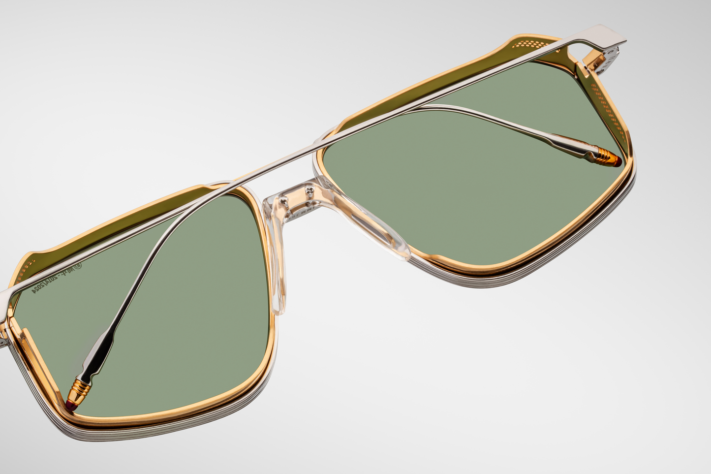 Back view of Jacques Marie Mage Jagger glasses in Electrum, highlighting the curved temples, inner hinge construction, and the elegant form of the perforated side shields