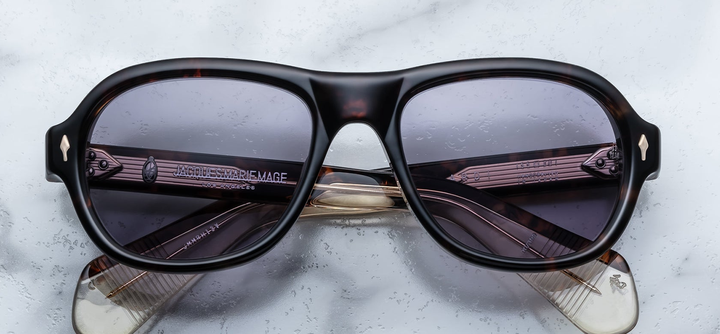 Front view of Jacques Marie Mage Richard sunglasses in Beau: mid-sized aviator-style frame crafted from rich Havana 10mm cured cellulose acetate. Features a double-bridge design with sterling silver arrowhead front pins and a sleek hidden wirecore.