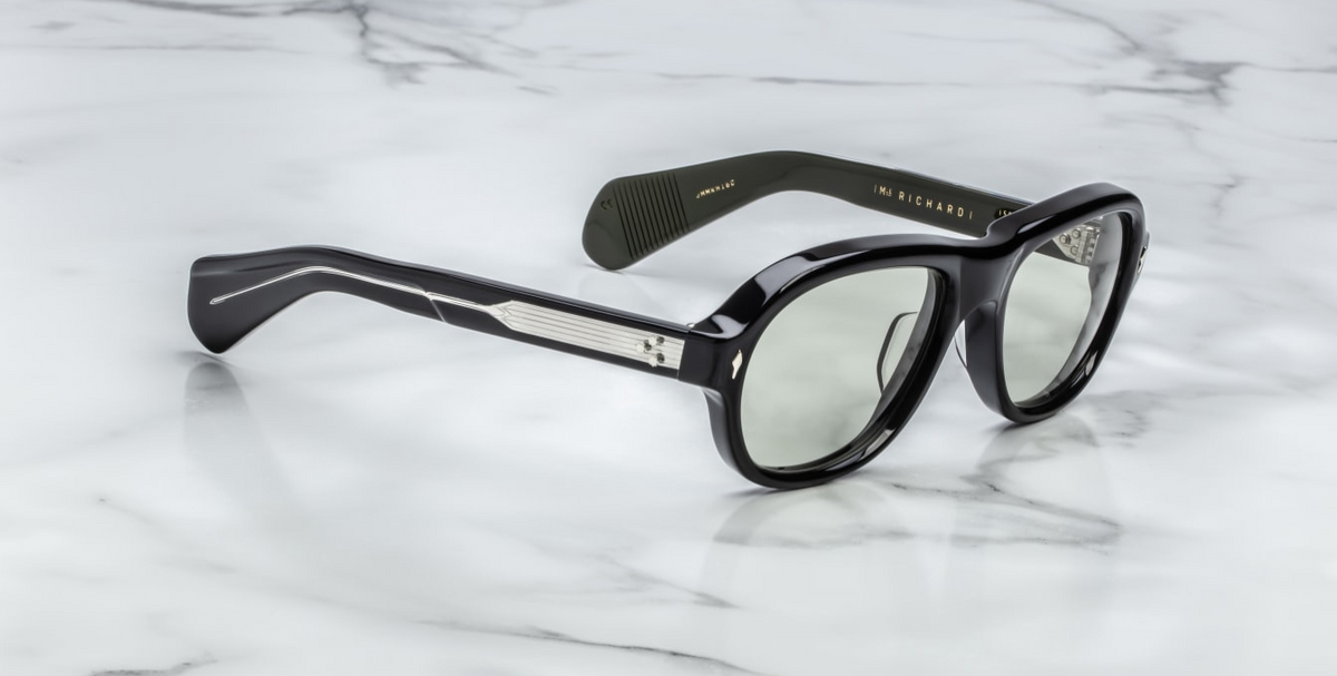 Side profile of Jacques Marie Mage Richard Cobra sunglasses, highlighting the sleek acetate frame with sculpted brow and cheek contours. The custom double-laminated acetate temples feature sterling silver accents and signature polished metal embellishments, emphasizing the frame's luxurious craftsmanship