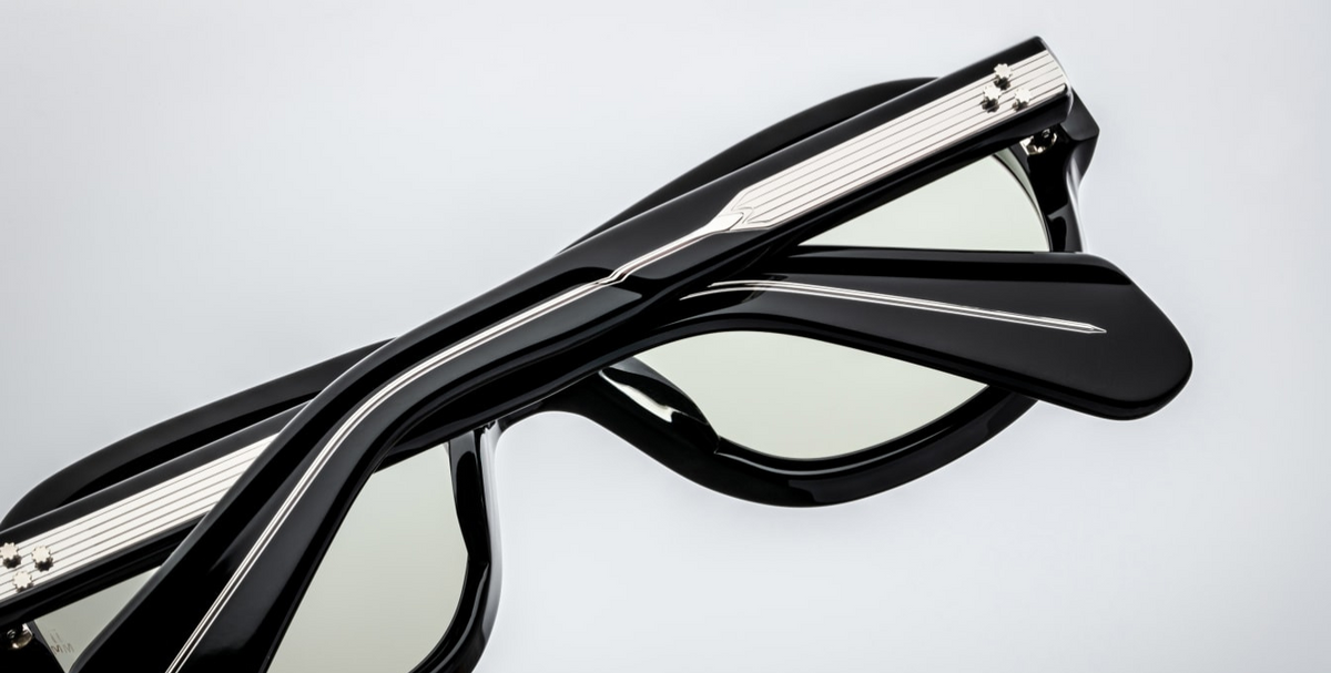 Back view of Jacques Marie Mage Richard Cobra sunglasses, showcasing the black-toned acetate frame with sculpted brow and cheek contours. The sterling silver arrowhead front pins and exposed wirecore details are prominently displayed, reflecting the frame's artisanal craftsmanship