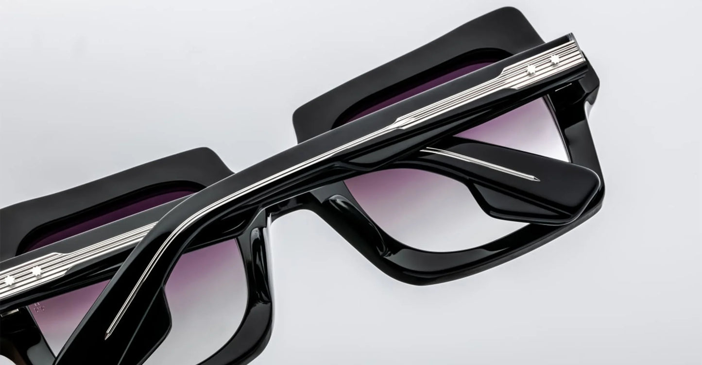 Back view of Jacques Marie Mage Velvet Underground Squeeze sunglasses in Noir, showing the interior frame design, curved temples, and glossy black acetate finish