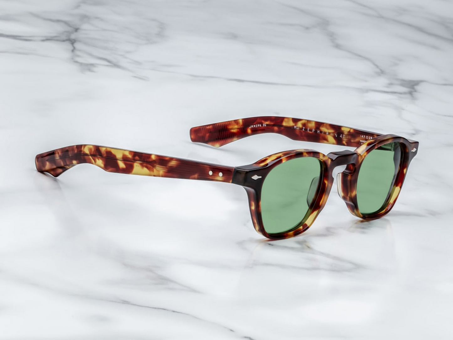 Side view of Zephirin Baltic by Jacques Marie Mage: thick double‑laminated acetate temples with silver wire‑core, hand‑polished finish, engraved model & serial on inner temple
