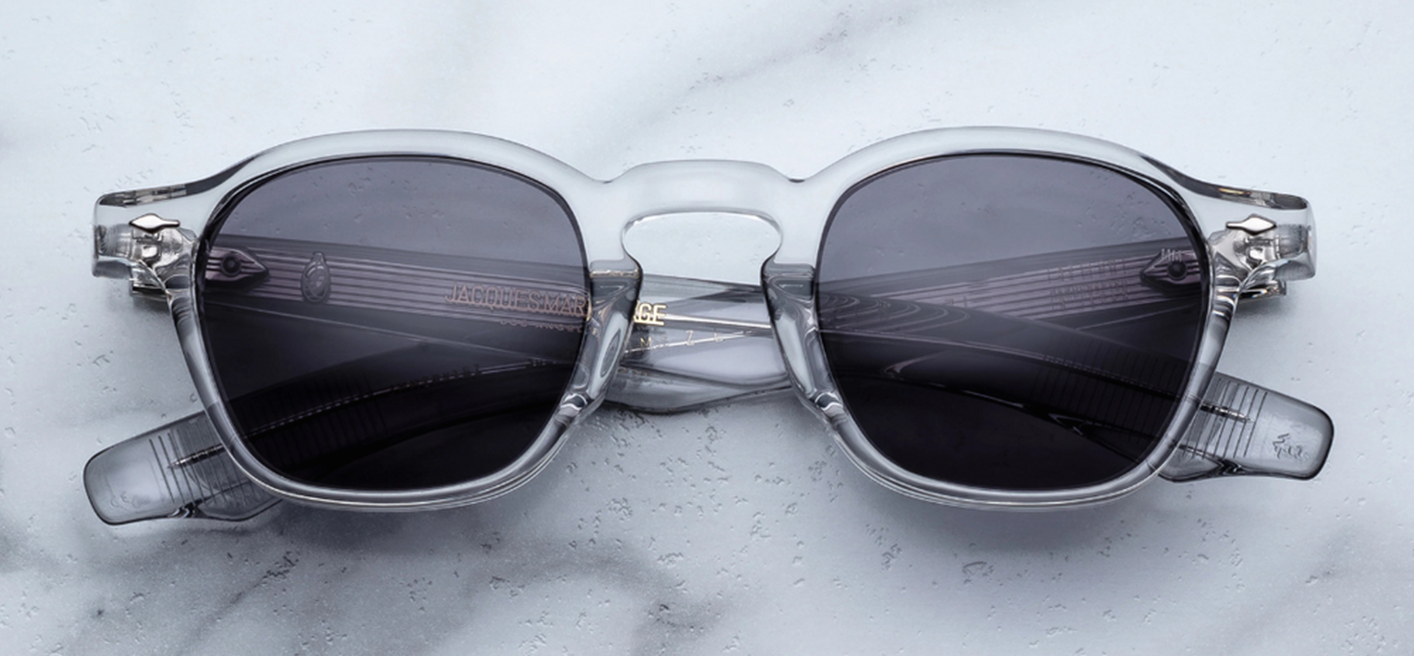 Front view of JMM Zephirin Sulfur sunglasses: squared 47mm medium frame in transparent 10mm cured Japanese acetate, keyhole bridge, crisp grey‑gradient CR39 lenses, iconic JMM arrowhead front pin