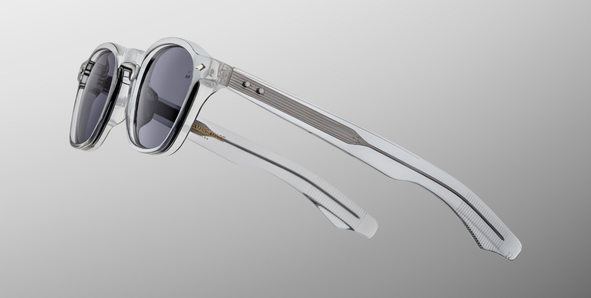 Side view of Zephirin Sulfur by Jacques Marie Mage: layered double‑laminated acetate temples in translucent frame, exposed silver wire‑core, silver tension‑secured custom 5‑barrel hinge with spur‑shaped sterling silver rivets