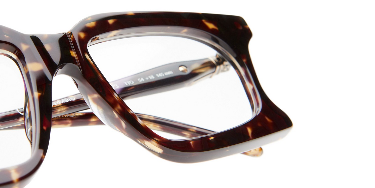 Overhead shot of Kuboraum D73 glasses highlighting the rectangular lens outline, bridge and acetate frame symmetry from above