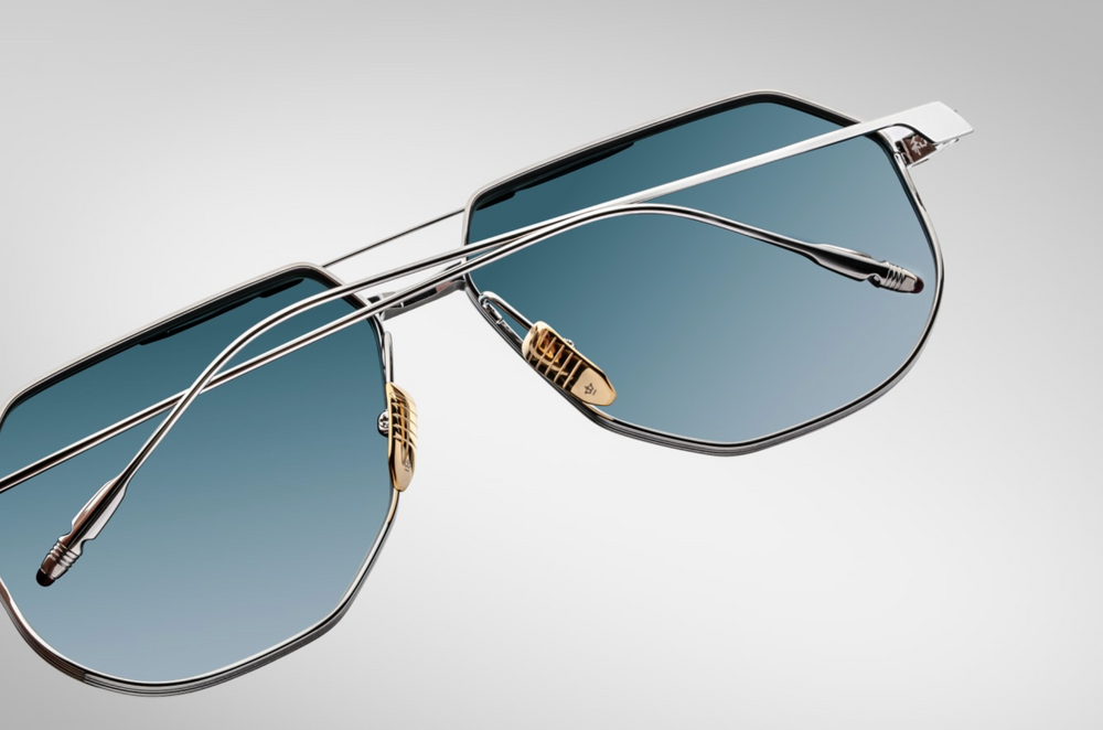 Back detail of the Jacques Marie Mage Reynold Pacific an oversized, ’70s-inspired titanium aviator in silver and black 100% beta titanium frame , engraved double bridge, signature tail‑fin temples with blue gradient lenses. Limited to j500 handcrafted pieces. WINK Optometrists