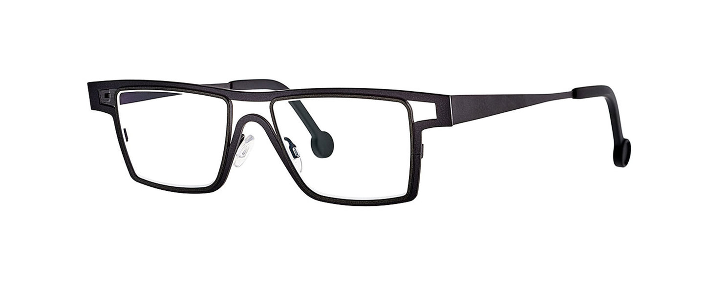Theo Lemon Curd eyewear in grey and black, featuring a unique and modern design with a bold frame and distinctive geometric shapes.
