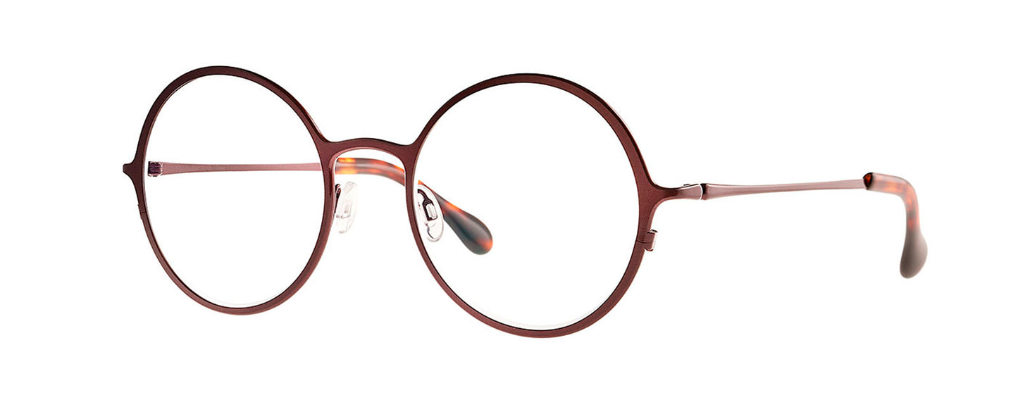 Theo Mercury Bluesy Red eyewear featuring a bold, geometric frame design with a vibrant red and blue color scheme, showcasing a modern and artistic style.