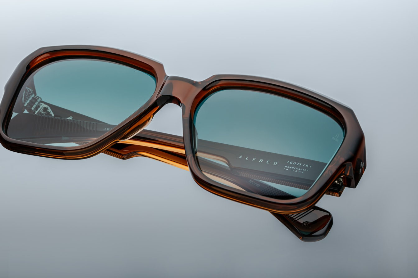 Top view of Jacques Marie Mage Alfred Hickory glasses showcasing bold acetate frame and sculptural browline design