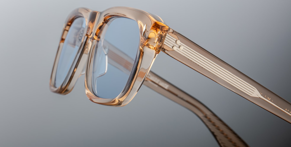 Inspired by Yves Saint Laurent, a French fashion designer. An Icon of JMM with soft angles and notable volumes. Clear tan 10mm cured cellulose acetate frame with custom double laminated acetate temples and blue lenses Limited edition of 350 pieces. Handcrafted in Japan Size 56/19. 