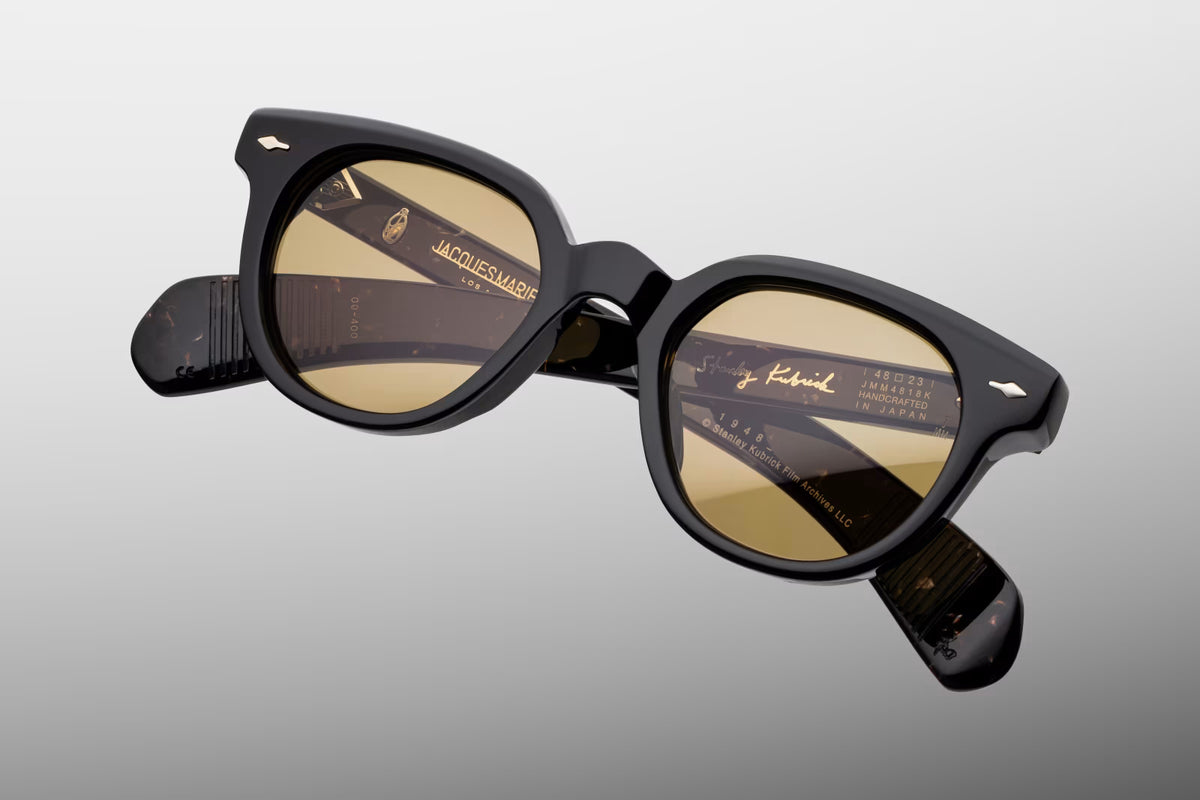 Top-down angle of the Stanley Kubrick 1948 Willow glasses. Reveals the substantial thickness of the 10mm cured acetate frame beveling, the secure curve of the keyhole nose bridge, and the interior alignment of the temples.