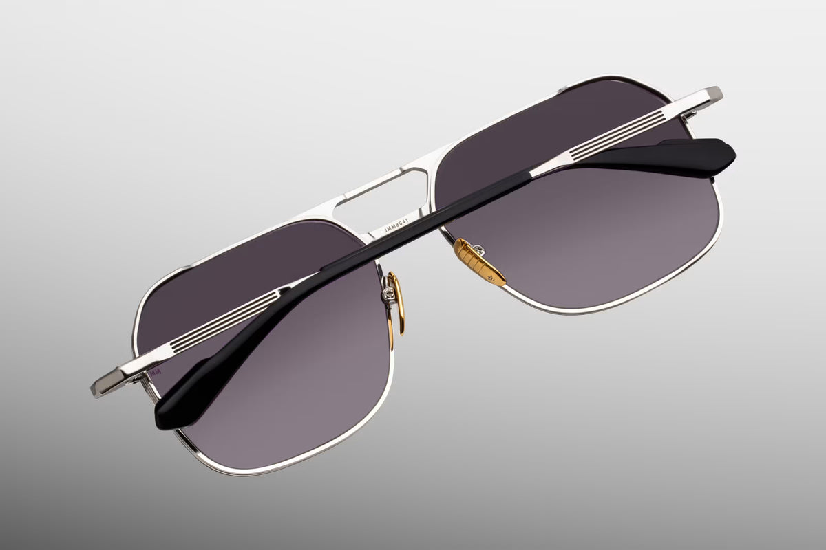 Rear perspective of the Jacques Marie Mage 1980 sunglasses in Silver. Reveals the interior architecture of the metallic silver aviator frame, showcasing the inner anti-reflective coating on the category 3 jet gradient lenses and the signature integrated hidden butterfly hinges.
