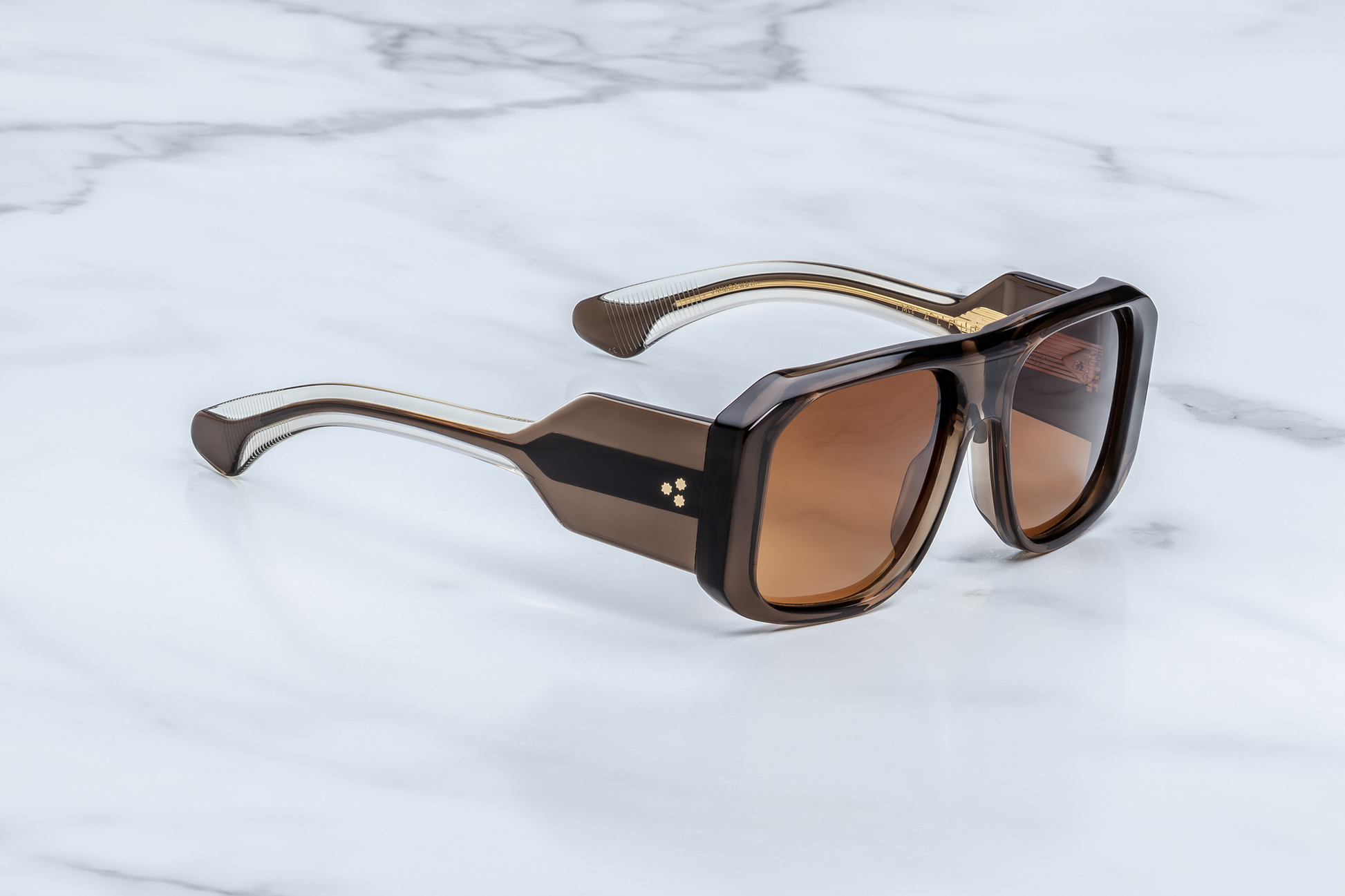 Jacques Marie Mage Alfie London sunglasses three quarter angle highlighting sculpted grey acetate frame, thick temples and luxury craftsmanship – available at Wink Optometrists