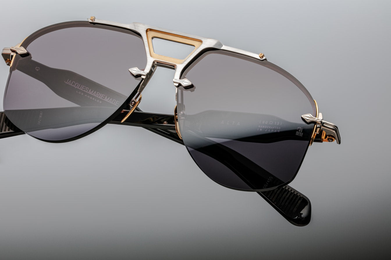 Rimless Series aviator sunglasses with dual-tone metal details, sculptural acetate temples, and blue titanium frame. Handcrafted in Japan.