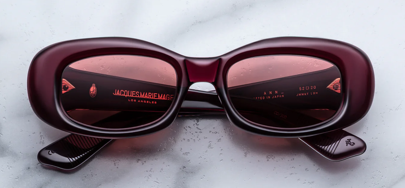 Jacques Marie Mage Ann Amarena sunglasses front view, rectangular butterfly-inspired frame in deep cherry red acetate with sculpted 90s silhouette
Front view of JMM Ann Amarena glasses, medium-fit rectangular eyewear in rich red acetate with signature metal rivets