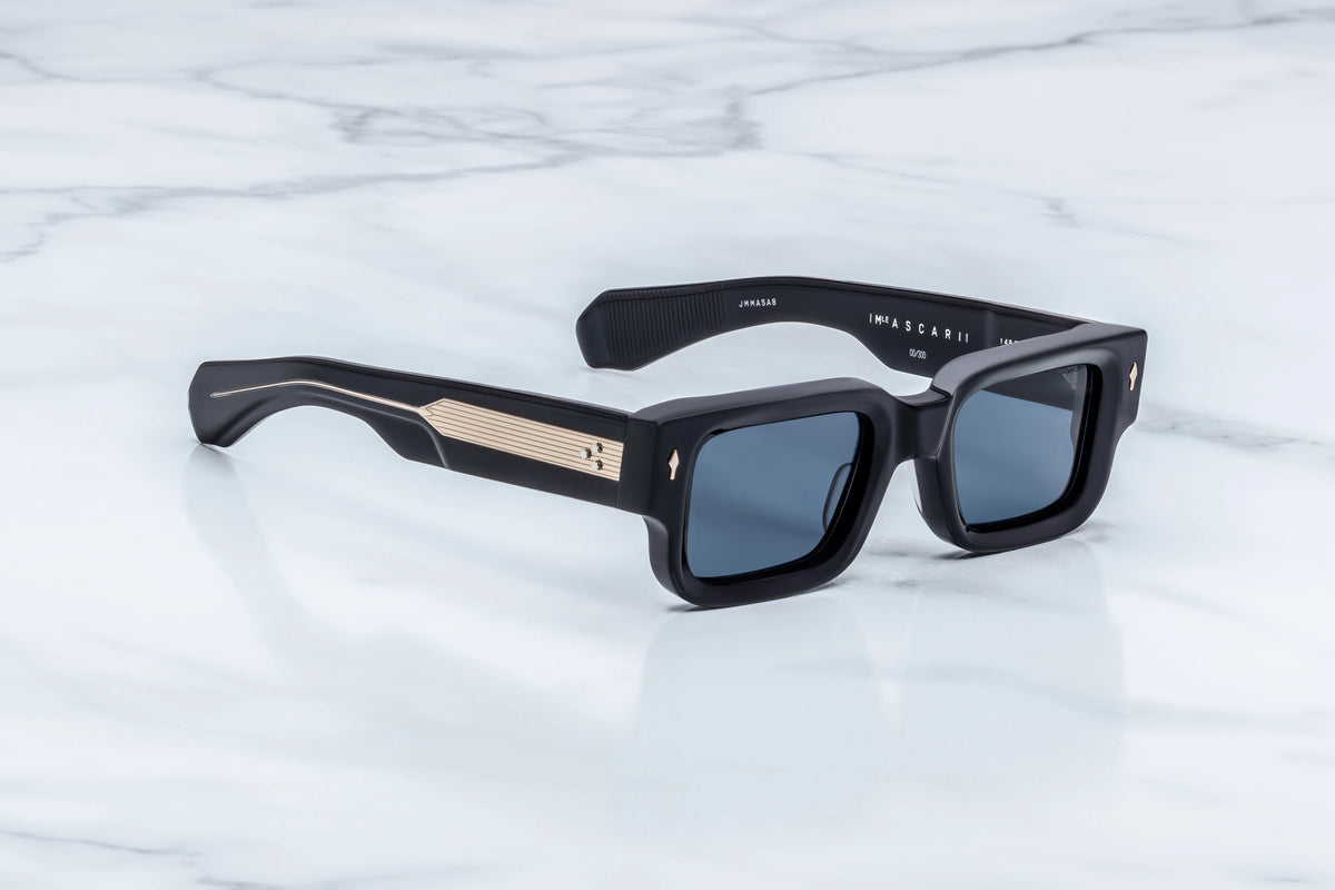 Side profile of JMM Ascari Lacquer glasses showing double-laminated dark blue temple arms.