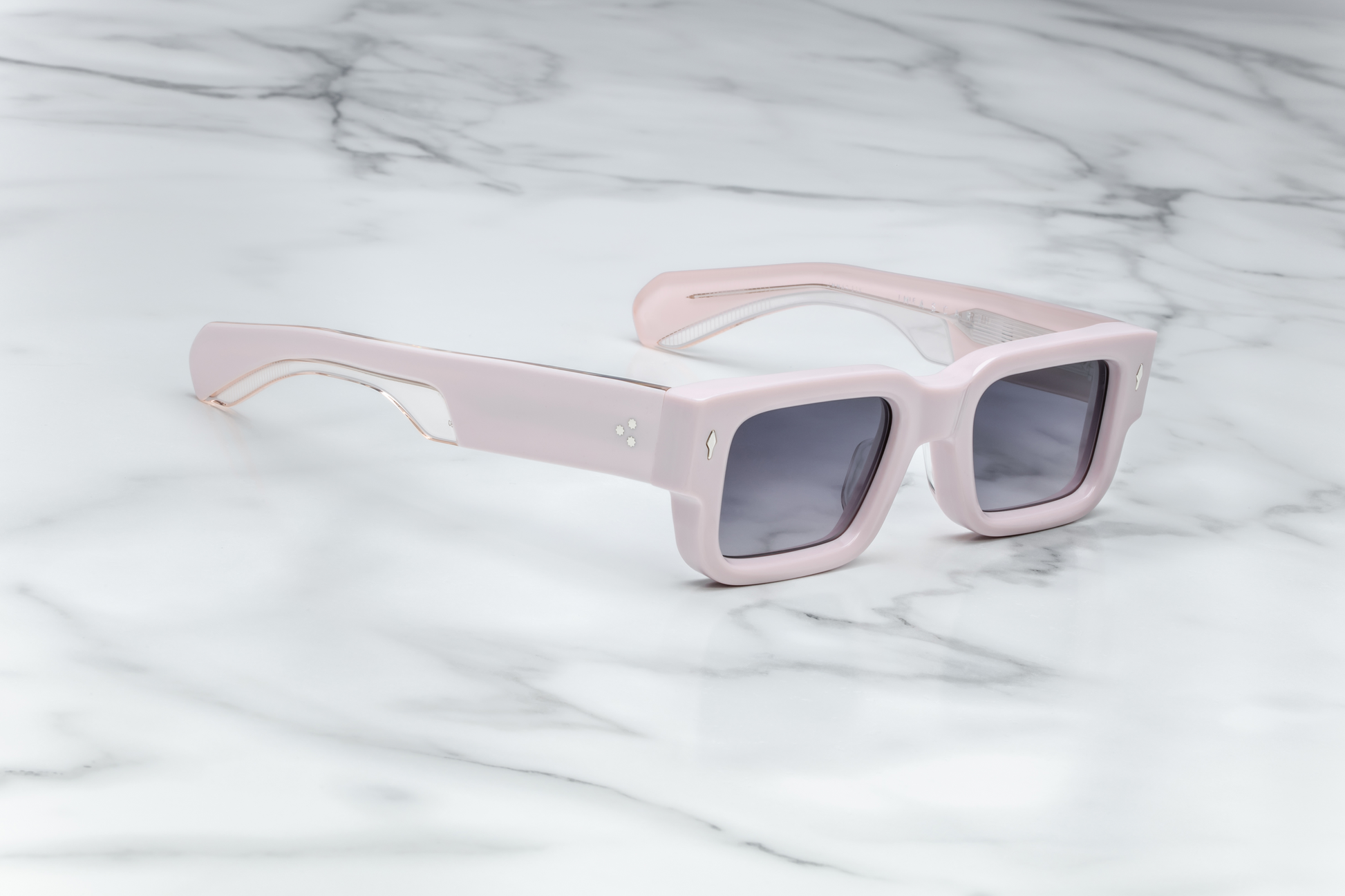 Side profile of Jacques Marie Mage Ascari Marshmellow sunglasses showing sculpted temples and signature silver hinge detailing, available at WINK Optometrists.