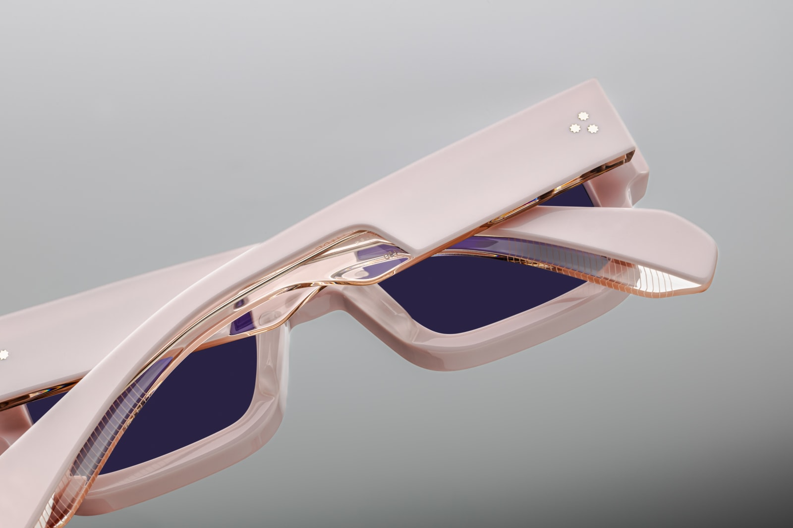 Back view of Jacques Marie Mage Ascari Marshmellow sunglasses displaying interior temple detailing and elegant frame curvature, available at WINK Optometrists.