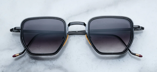 Front view of Jacques Marie Mage Atkins sunglasses in Slate, featuring a bold rectangular grey acetate frame, available at WINK Optometrists.