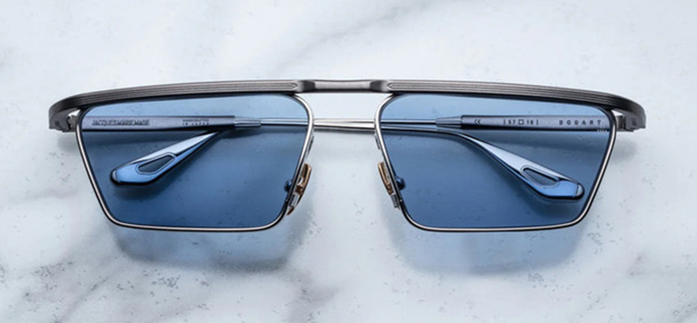 Front view of Jacques Marie Mage Bogart sunglasses in Gris, featuring a bold rectangular grey acetate frame, available at WINK Optometrists.