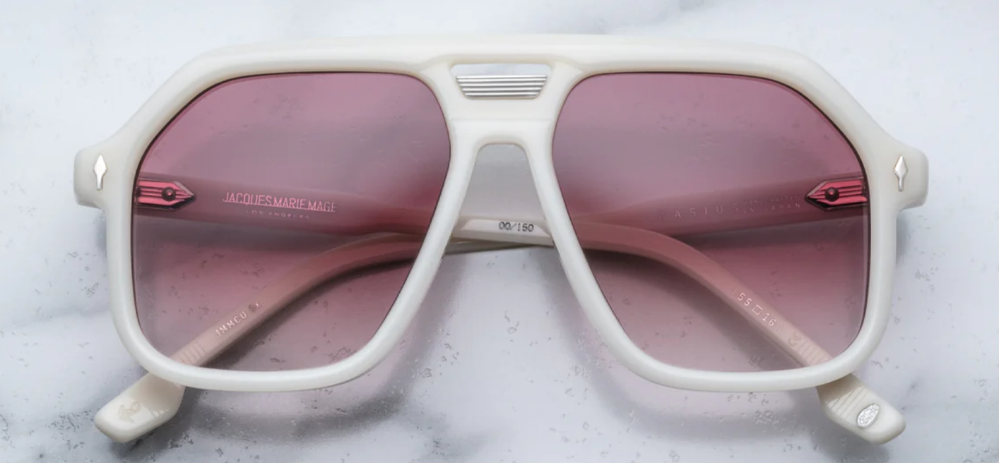 Jacques Marie Mage Casius Lotus sunglasses featuring a bold, oversized square frame with a rich, dark tortoiseshell finish. The sunglasses include intricate, gold-tone metal detailing on the temples and a luxurious, high-quality construction with dark lenses offering UV protection. A statement accessory that combines contemporary style with craftsmanship