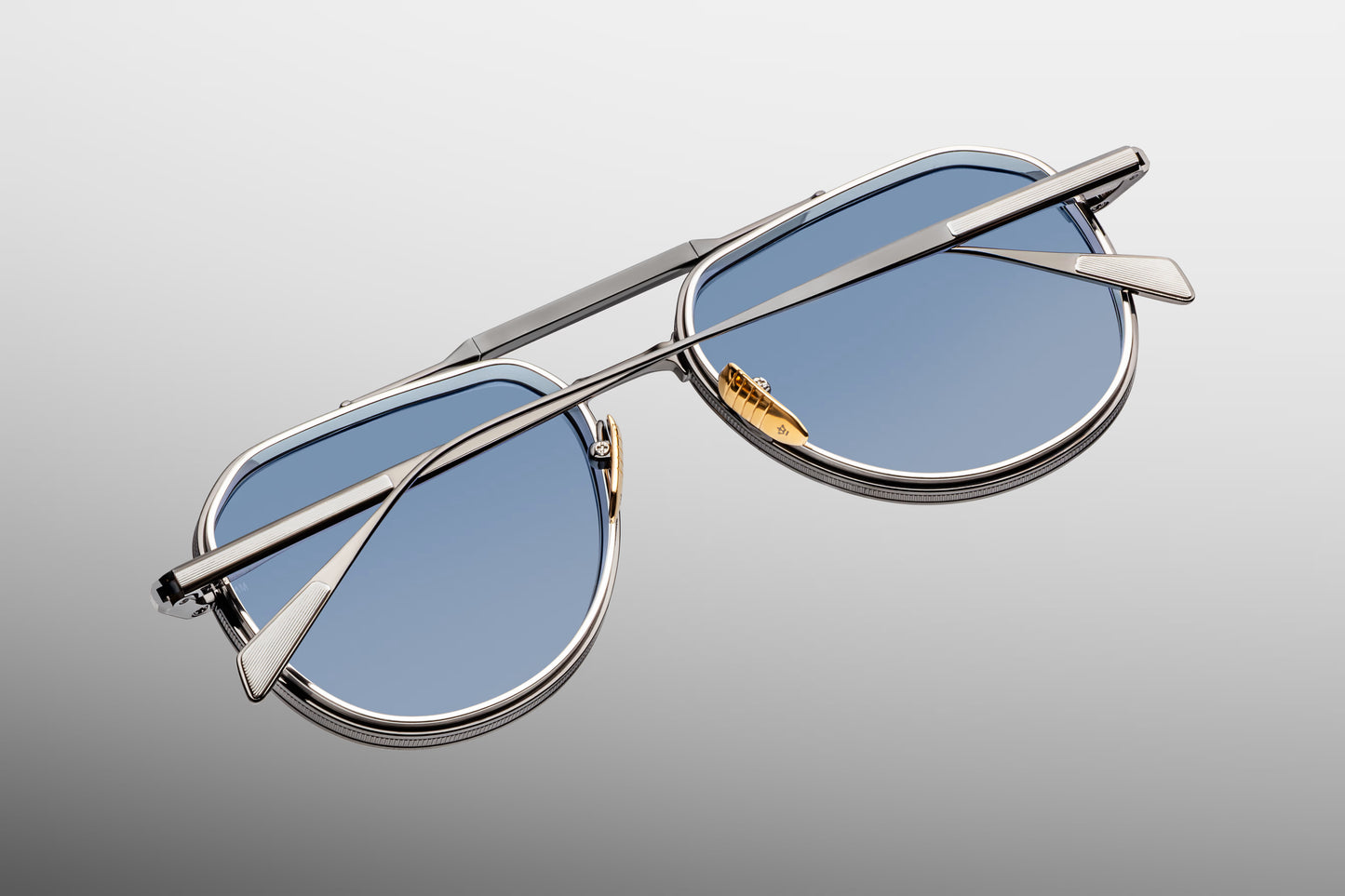 Close-up back view of Jacques Marie Mage Commander Antique Silver sunglasses showing inner temple engraving and titanium structure
Rear detail of JMM Commander Antique Silver frame revealing handcrafted metalwork and limited edition detailing