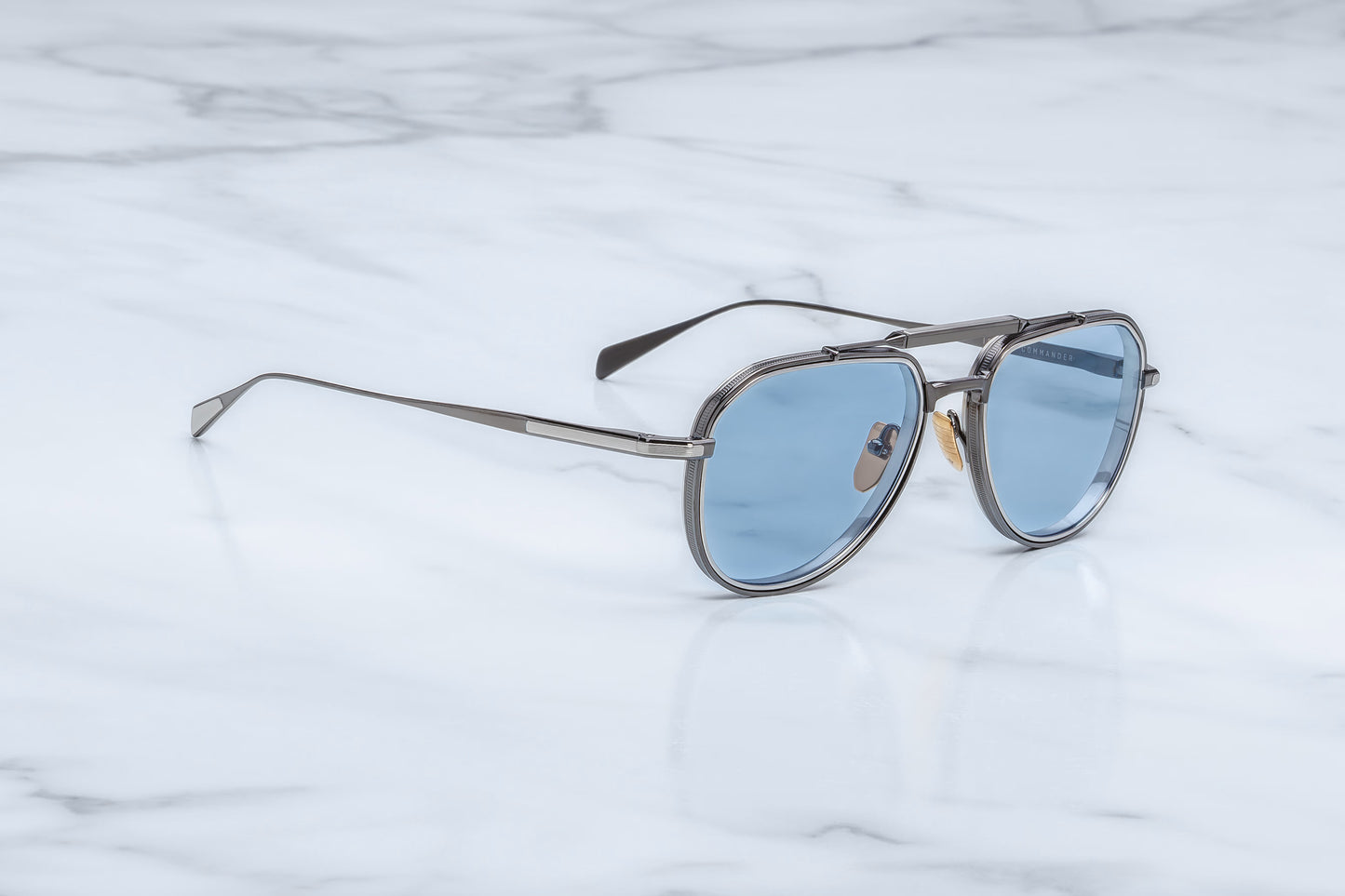 Jacques Marie Mage Commander Antique Silver side view showing slim beta titanium temples, engraved detailing and precision hinge construction
Side profile of JMM Commander Antique Silver sunglasses highlighting lightweight aviator frame and refined metal finish