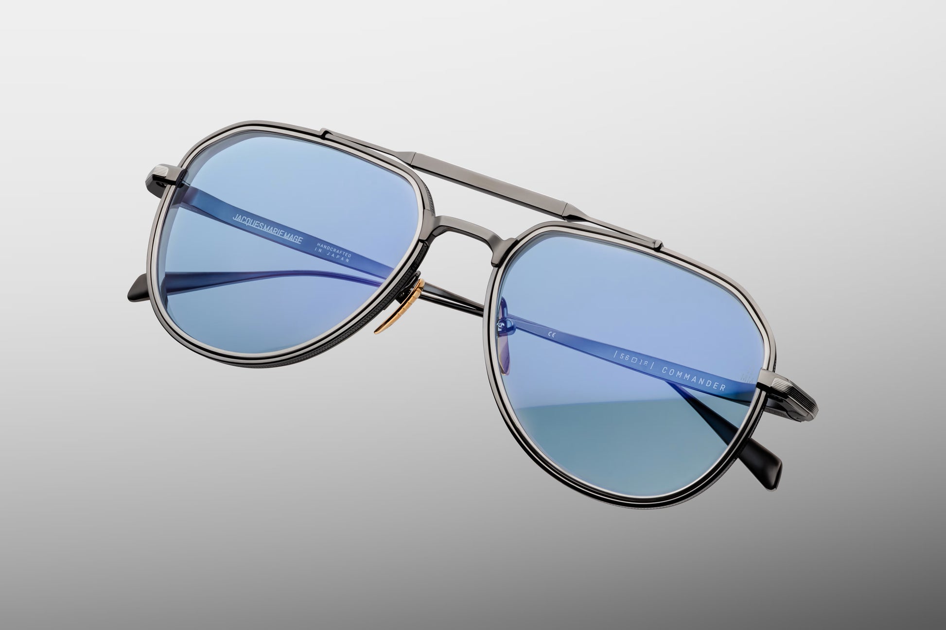 Close-up front detail of Jacques Marie Mage Commander Antique Silver frame showing dual bridge, silver lens inserts and brushed titanium texture
Macro front view of JMM Commander Antique Silver aviators highlighting sculptural bridge and premium craftsmanship