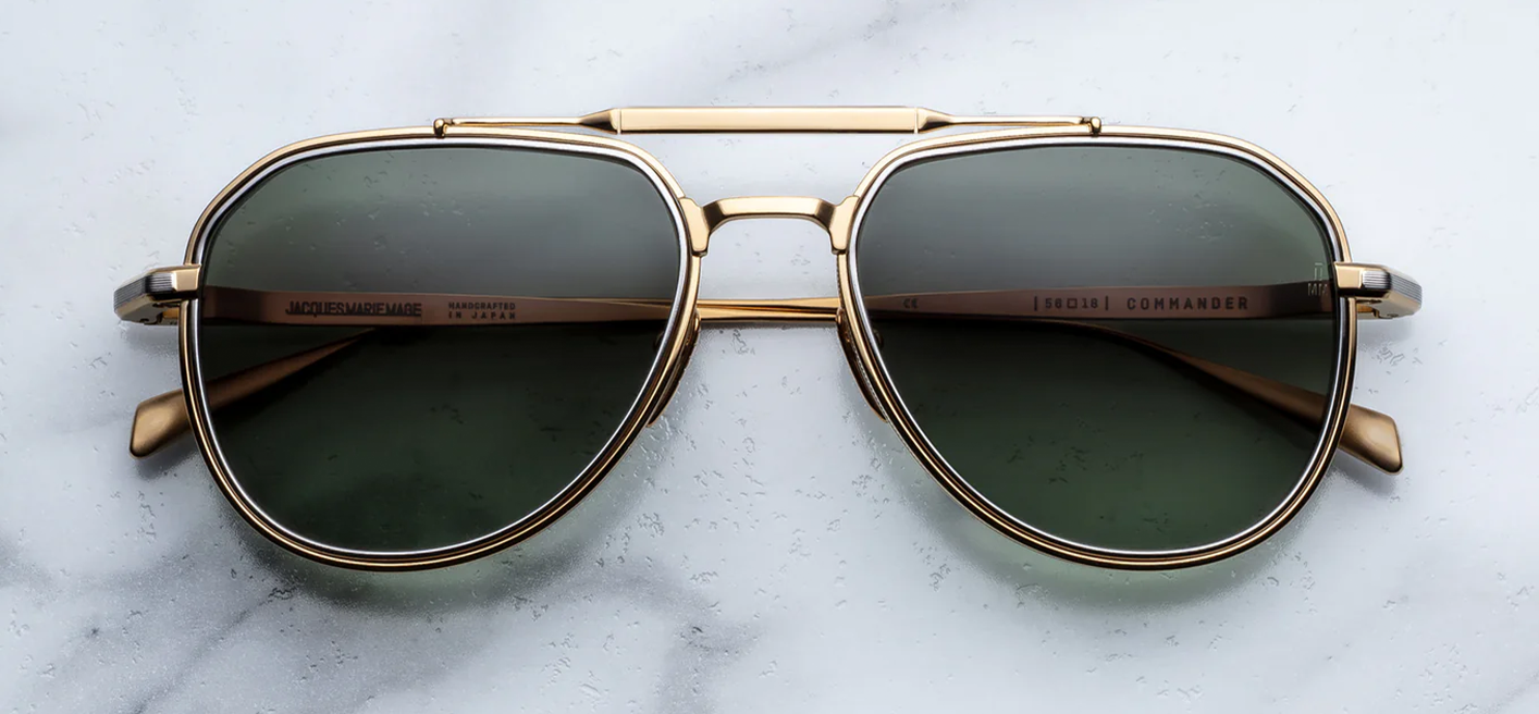 acques Marie Mage Commander Musket sunglasses front view, oversized aviator frame in gold titanium with dual bridge and silver lens rim inserts
Front view of JMM Commander Musket aviators, ’70s-inspired pilot silhouette with sculpted titanium construction and gradient lenses