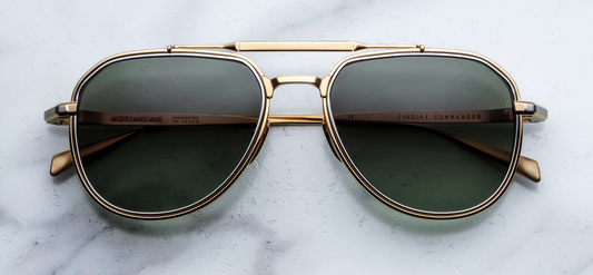 acques Marie Mage Commander Musket sunglasses front view, oversized aviator frame in gold titanium with dual bridge and silver lens rim inserts
Front view of JMM Commander Musket aviators, ’70s-inspired pilot silhouette with sculpted titanium construction and gradient lenses
