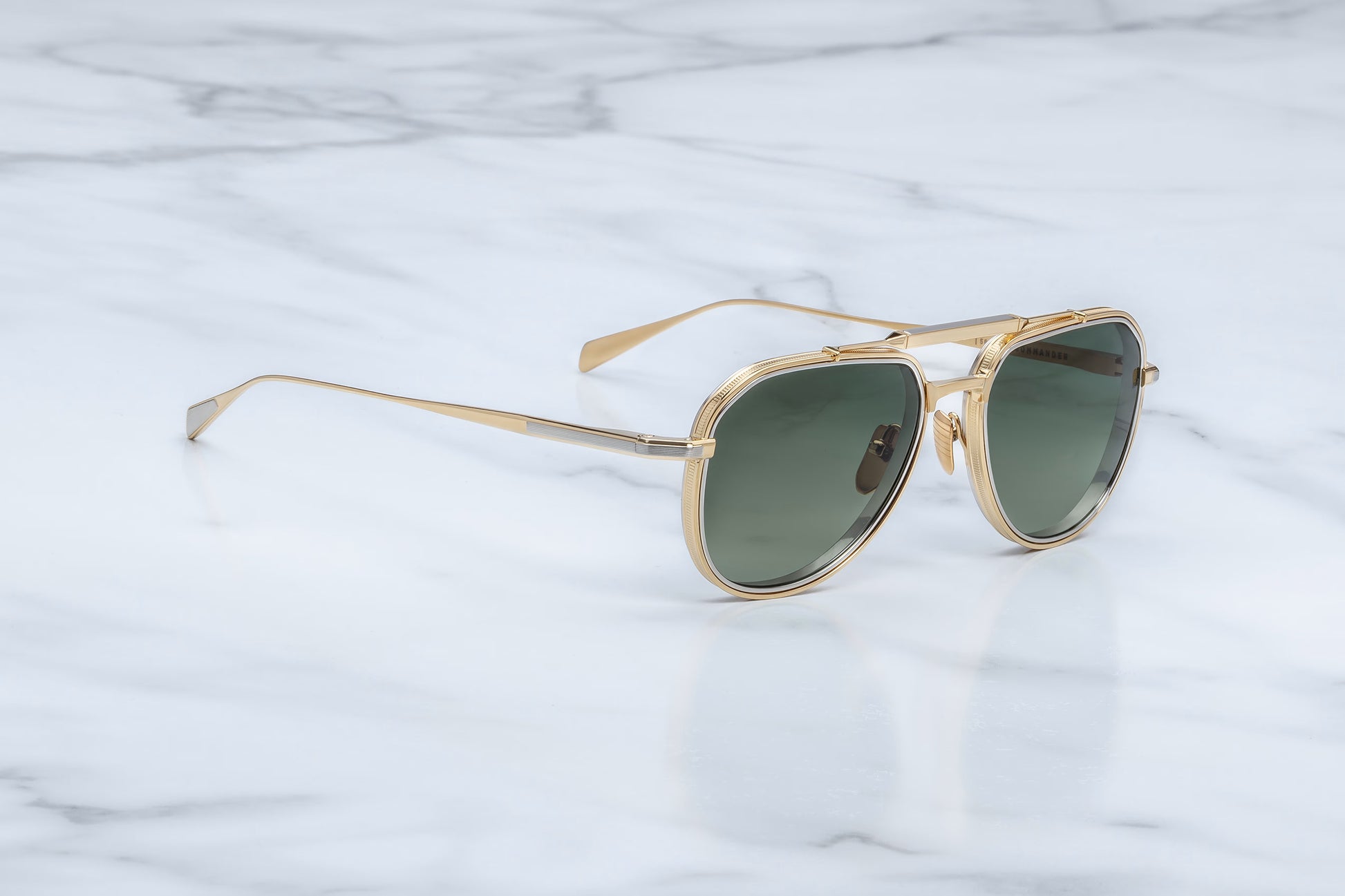 Jacques Marie Mage Commander Musket side view showing slim titanium temples, engraved detailing and precision hinge construction
Side profile of JMM Commander Musket sunglasses highlighting lightweight beta titanium frame and dual-tone hardware
