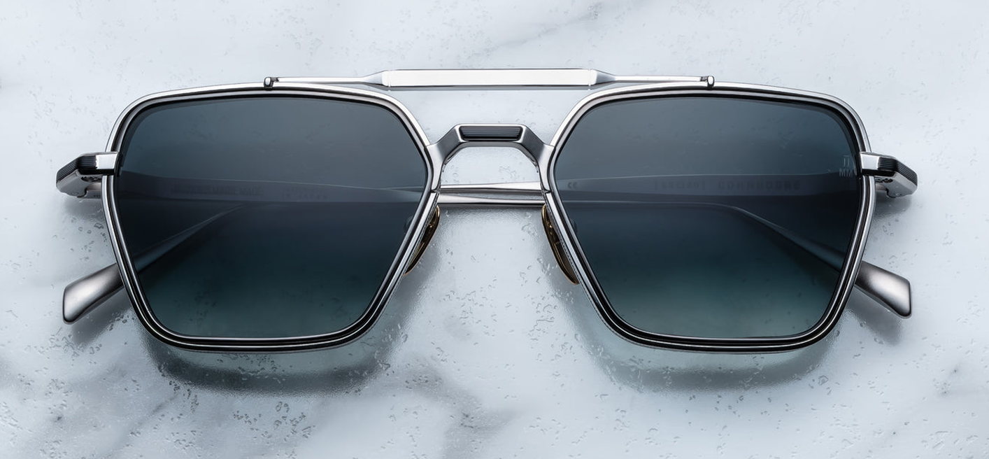 Front view of Jacques Marie Mage Commodore sunglasses in Pacific, featuring a bold blue acetate frame with geometric design, available at WINK Optometrists.