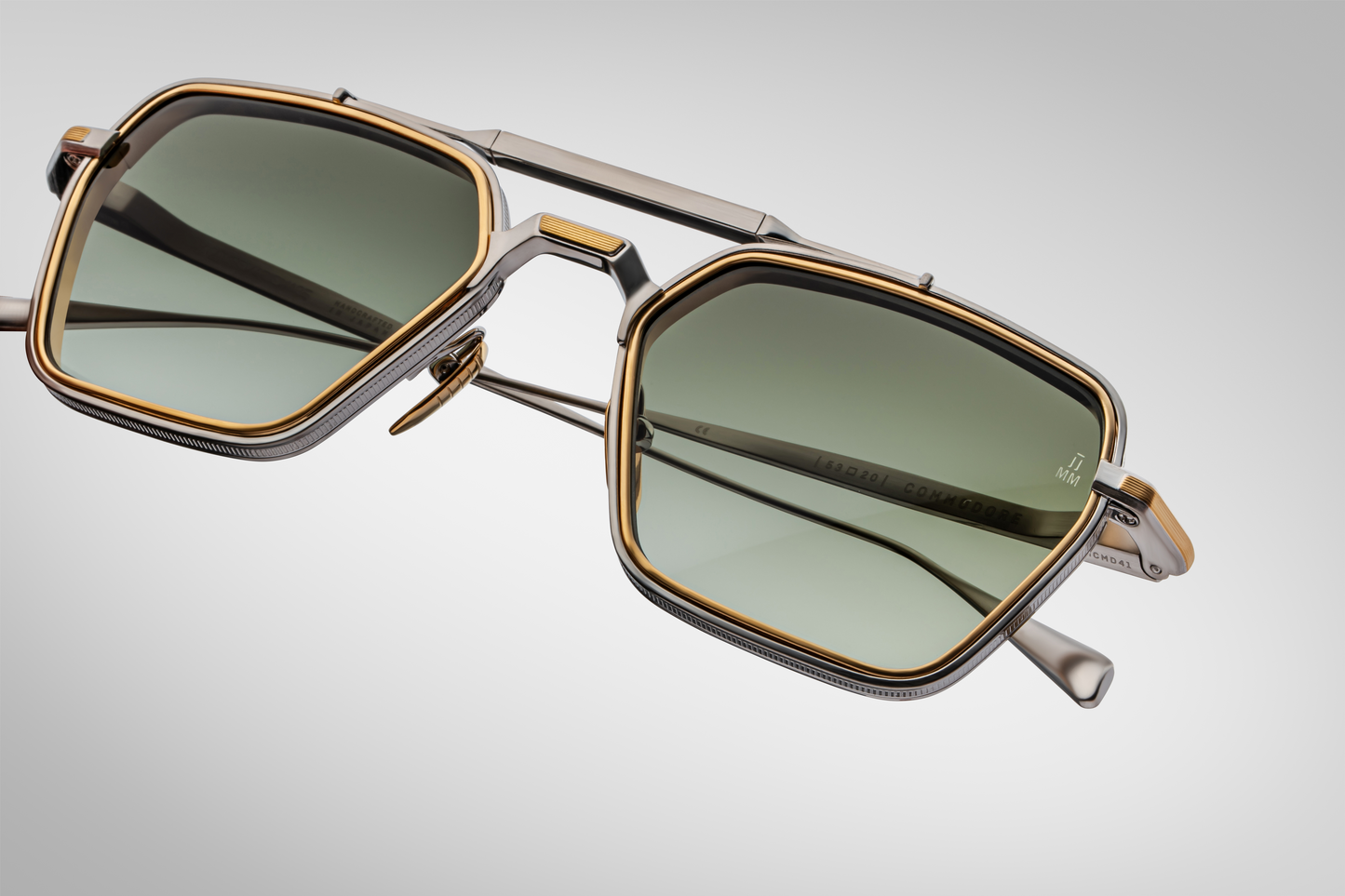 Close-up front detail of Jacques Marie Mage Commodore Silver sunglasses showing coined-edge titanium frame and double-bridge construction.