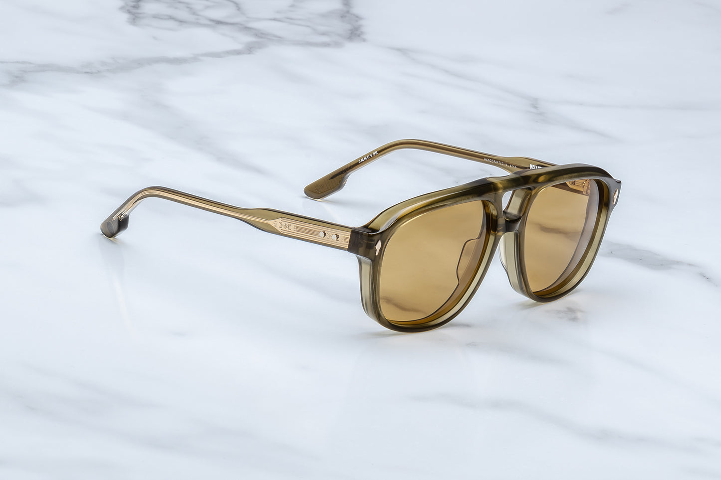 Side view Slip through the undergrowth in sleek ‘80s-inspired spectacles named for the Cougar Creek Pack, whose domain once stretched across the Grayling Creek drainage in Yellowstone’s wild northwest. Balanced and bold, these refined navigators feature a slim silhouette and distinctive double-bridge, handcrafted from polished plant-based acetate in Green Moss. Complemented by lenses in Dandelion yellow, they feature our signature arrowhead front pins, custom 5-barrel hinges, and hairline-engraved 'Spiketai