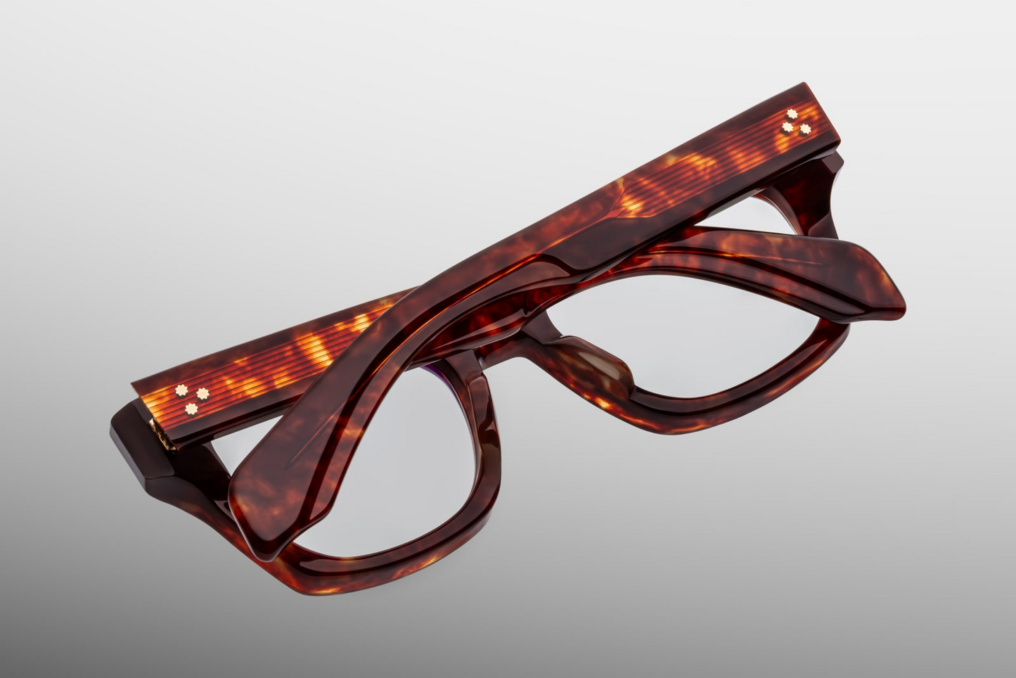 Back view of Jacques Marie Mage Dealan 53 Breccia optical glasses showing polished Breccia acetate finish and elegant 3D metal detailing on interior temples — available at WINK Optometrists Australia