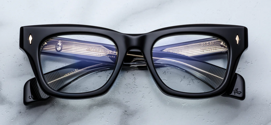 Jacques Marie Mage Dealan Venom optical RX eyeglasses front view, black acetate luxury frame with bold 1960s inspired silhouette and signature metal details