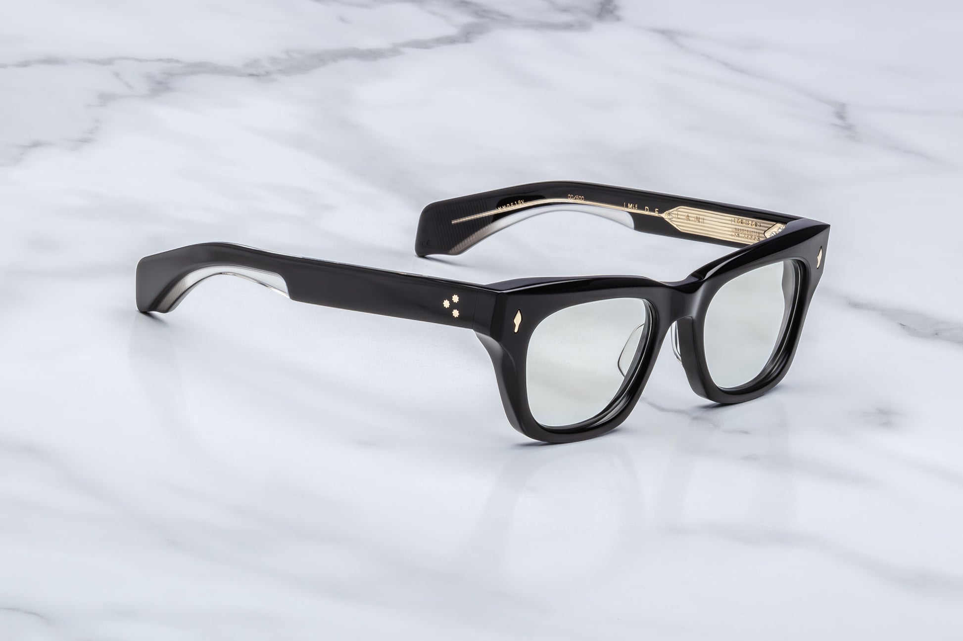 Jacques Marie Mage Dealan Venom RX optical glasses three quarter angle showing sculpted black acetate frame, green CR39 lenses and premium handcrafted construction