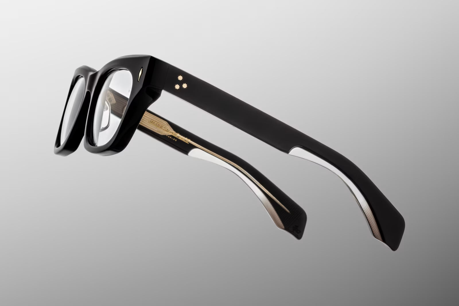 Jacques Marie Mage Dealan Venom optical RX side view highlighting thick acetate temples, exposed wirecore and signature arrowhead pins