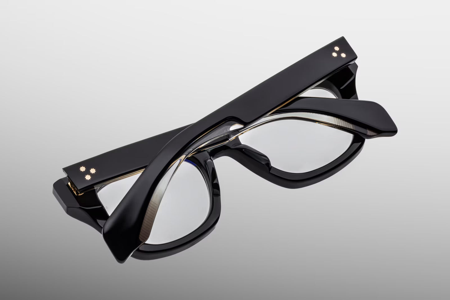 Jacques Marie Mage Dealan Venom eyeglasses detail of custom gold hardware, 7 barrel hinge and engraved wirecore in luxury handcrafted acetate frame