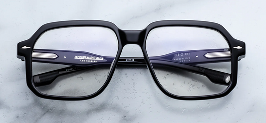 Jacques Marie Mage Domoto black optical frame front view, oversized rectangular acetate eyeglasses with signature arrowhead pins