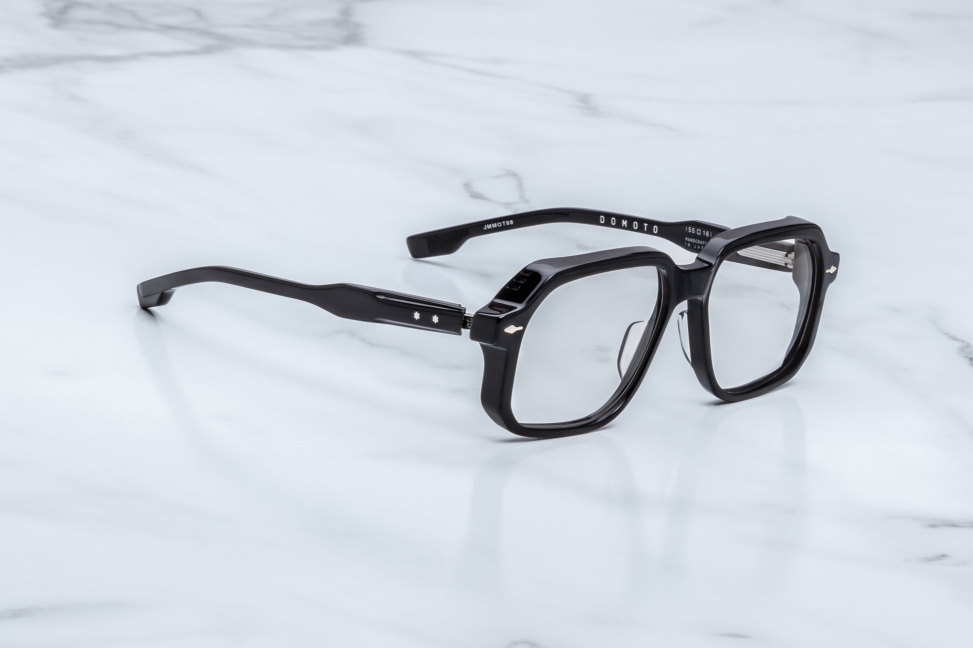 Jacques Marie Mage Domoto black optical frame side view showing thick acetate temples and exposed wire core detail