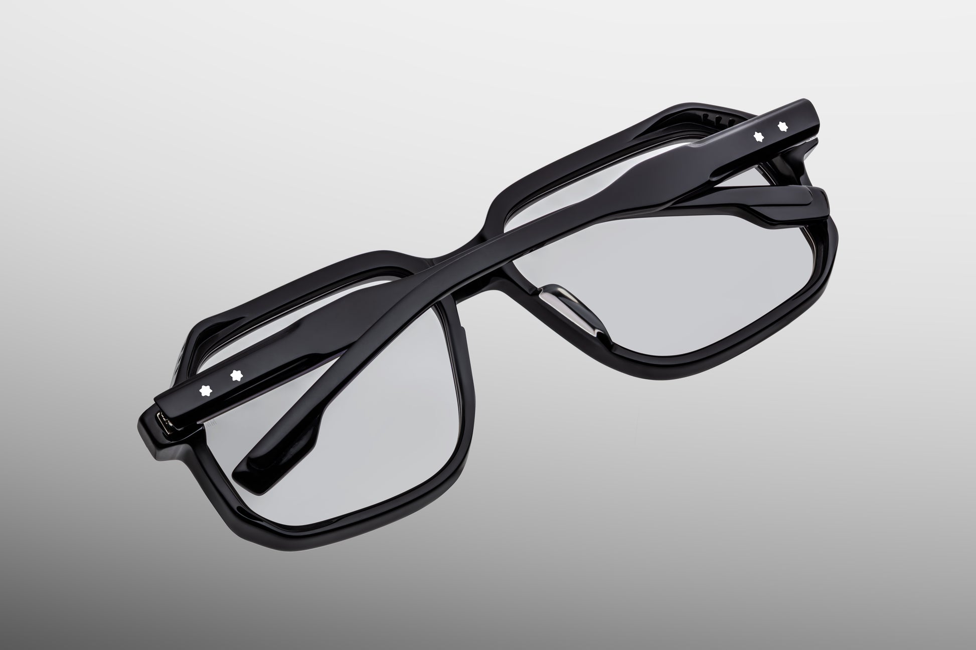 Close-up back view of Jacques Marie Mage Domoto black optical frame showing inner temple engraving and wire core
